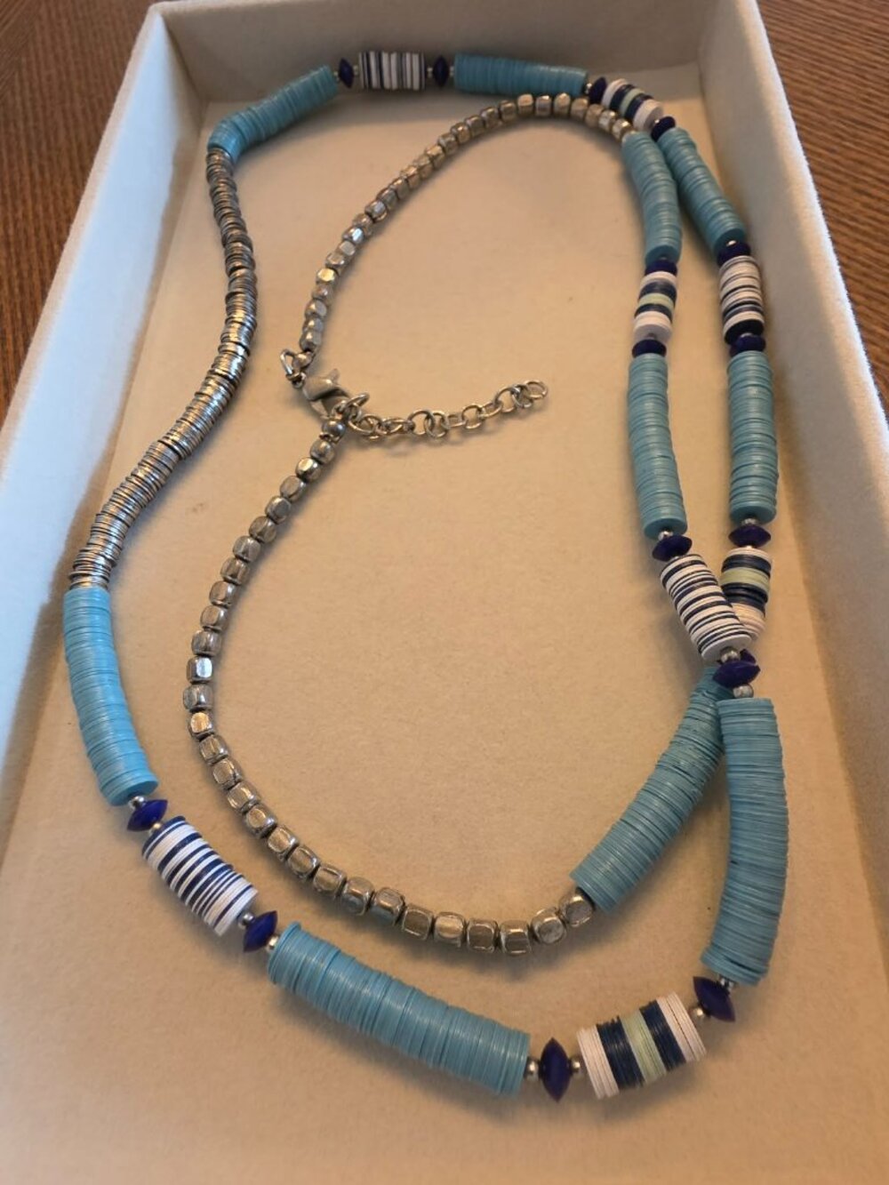 Long blue beaded necklace